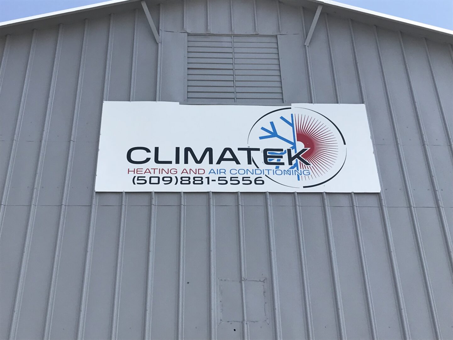 Climatek logo on white board on display